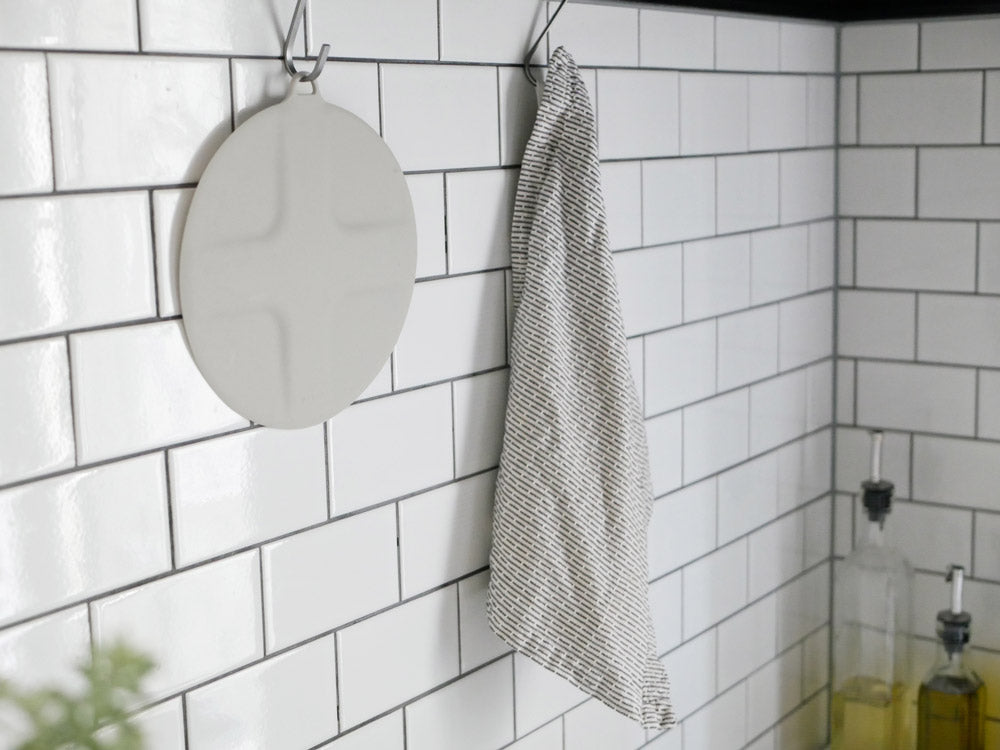 排水口に装着されたマーナの洗浄キャップ