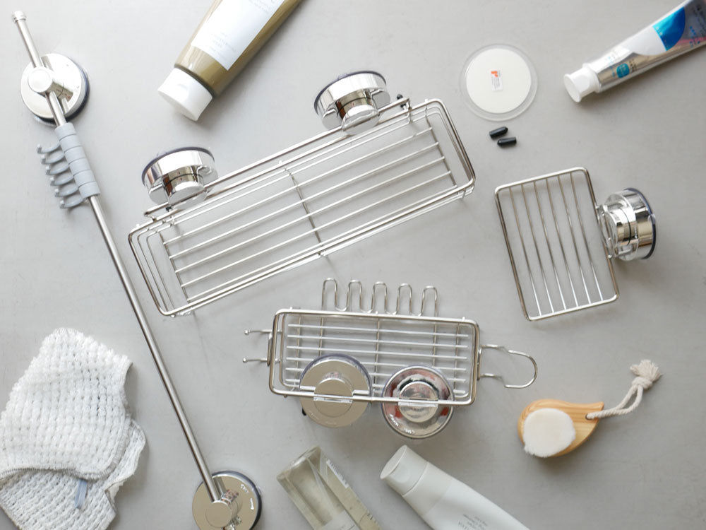 RIDDER(リダー)のメガログパッド。キッチンのガラス面に取り付けられた円形ABS製の強力吸着パッド