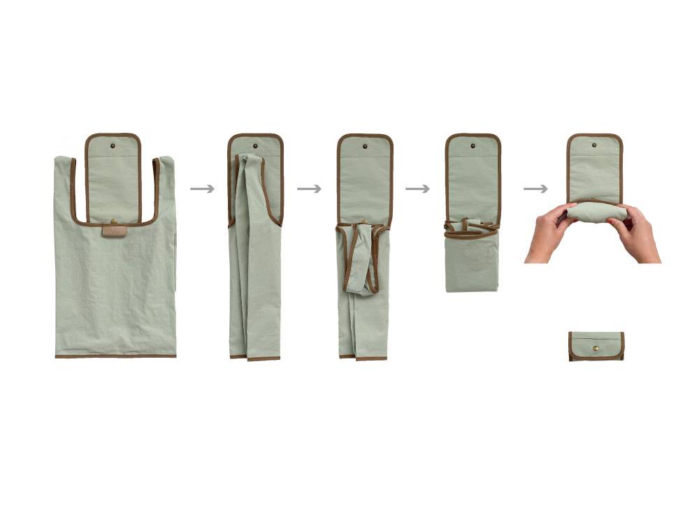 【RELIEF】エコバッグ。ナイロン100%製で開閉ボタンと内ポケットが付いた折りたたみ式バッグ。広げた状態での写真。