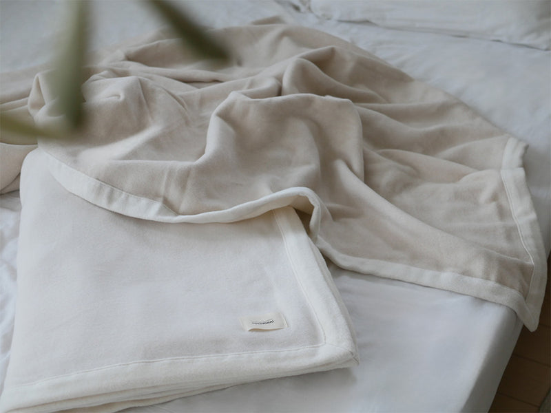 cocomaniのオーガニックコットン100%シングルサイズ毛布、アイボリー色の柔らかい寝具
