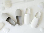 マーナの白いプラスチックスリッパ