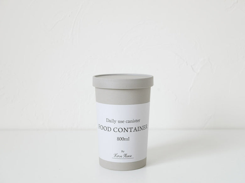 ホーンプリーズのエコキャニスター、蓋付きアイボリー色の円筒形容器