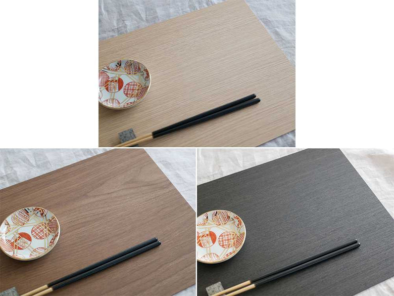 木製のバスクランチョンマットと箸がテーブルに配置された様子