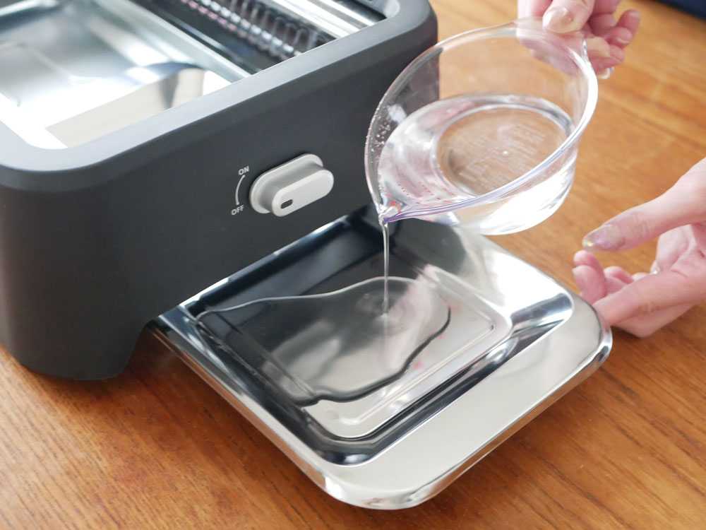 超少煙グリルと調理中の野菜が写った画像