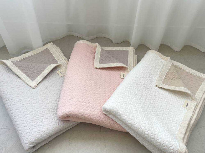 ココマニのリバーシブルオーガニックコットン敷パッド