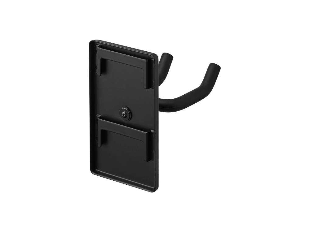 タワー型ウォールドライヤーホルダーが石こうボード壁に設置されている様子