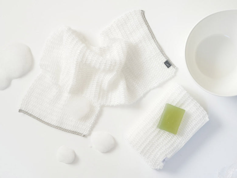 h tagボディウォッシュタオルの画像