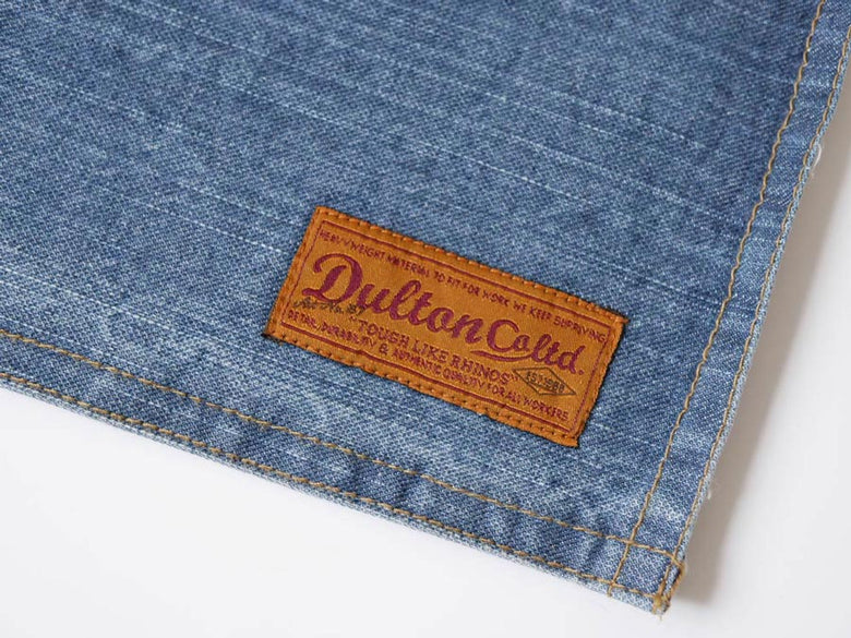 オレンジ色のコットン製ダルトンプレイスマット