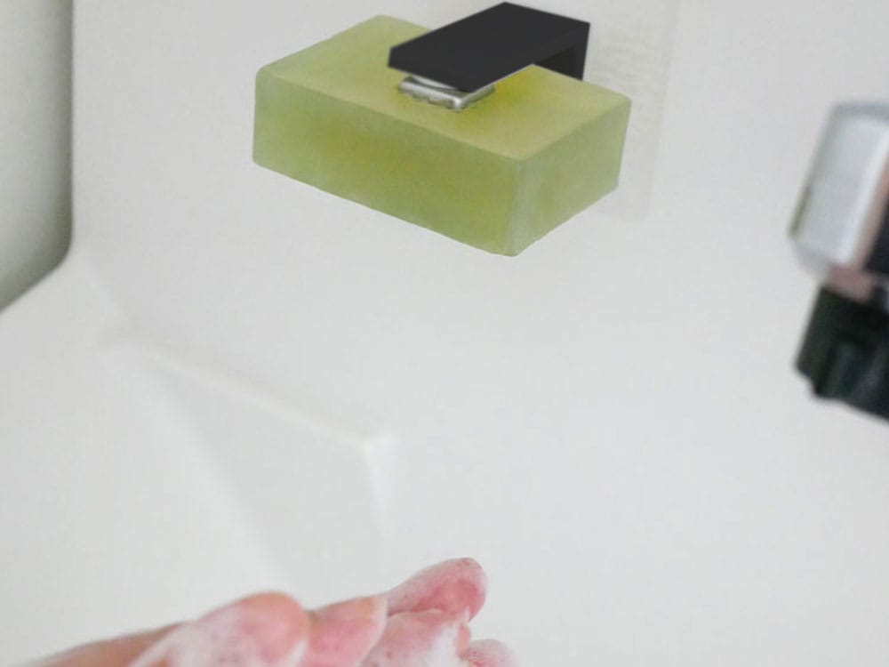 洗面台に取り付けられたフィルムフックマグネット