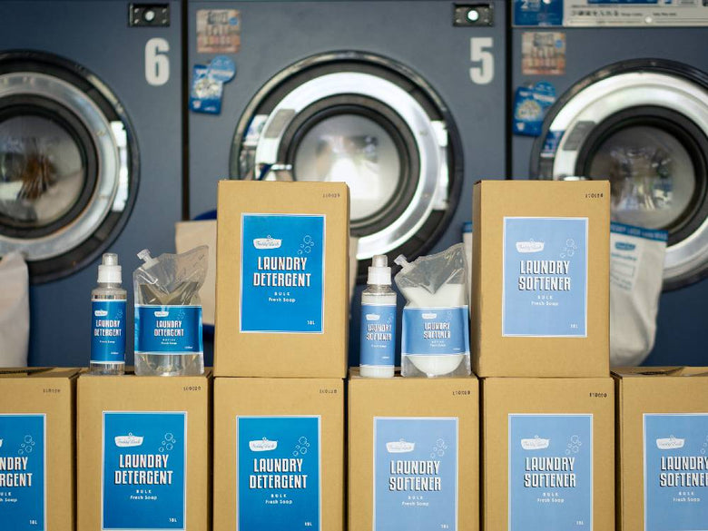 フレディレックランドリー洗剤のパッケージと洗濯機・乾燥機