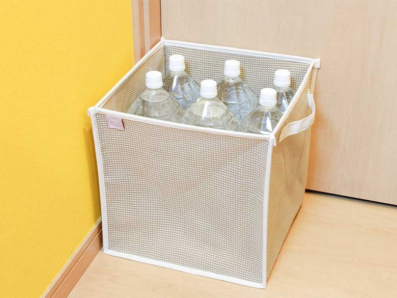 メッシュ製で蓋付きのコットン収納バスケット