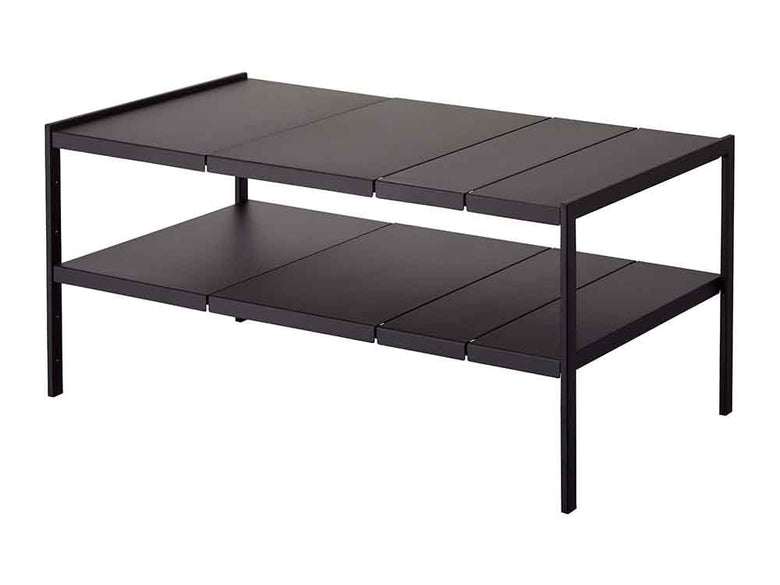 カーボンファイバー製の屋外用コーヒーテーブルと観葉植物