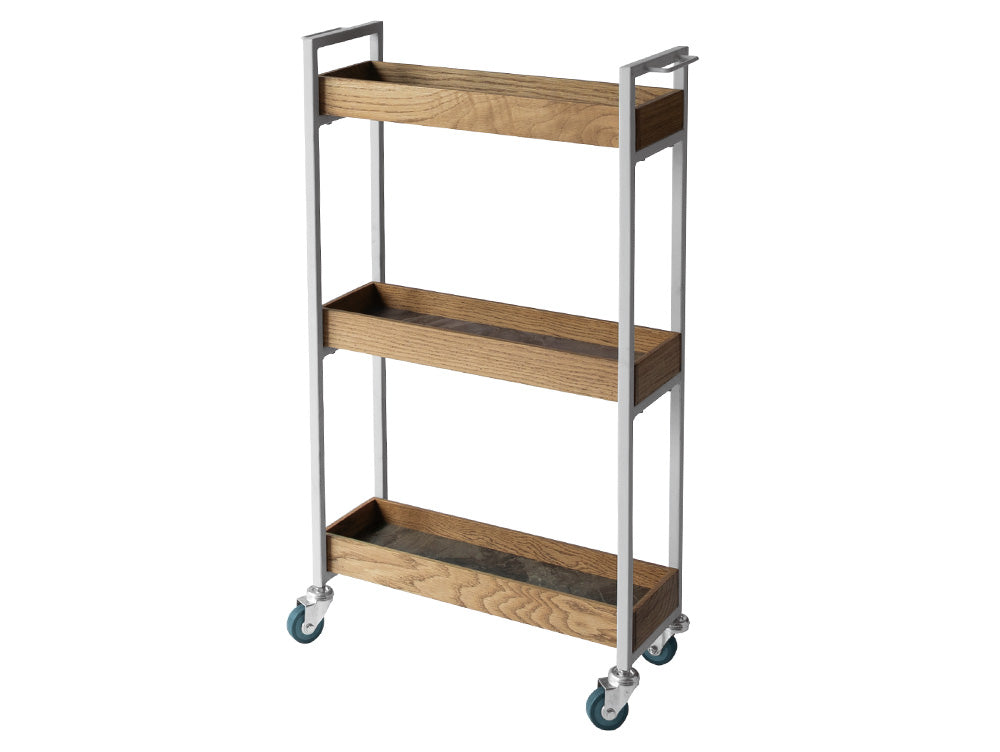 adepeche POLポル ムービングワゴンがキッチンでボトルや果物などの食品を収納する棚として使用されている様子