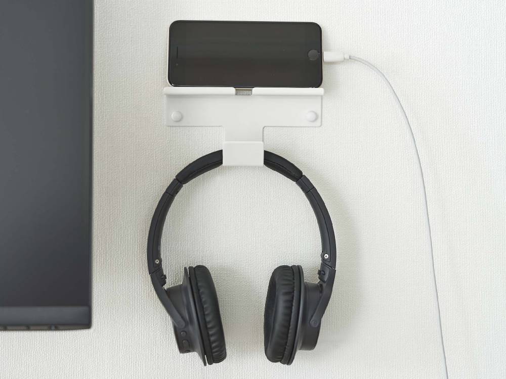 壁に取り付け可能なスマートフォンとヘッドホンを収納するスチール製ホルダー