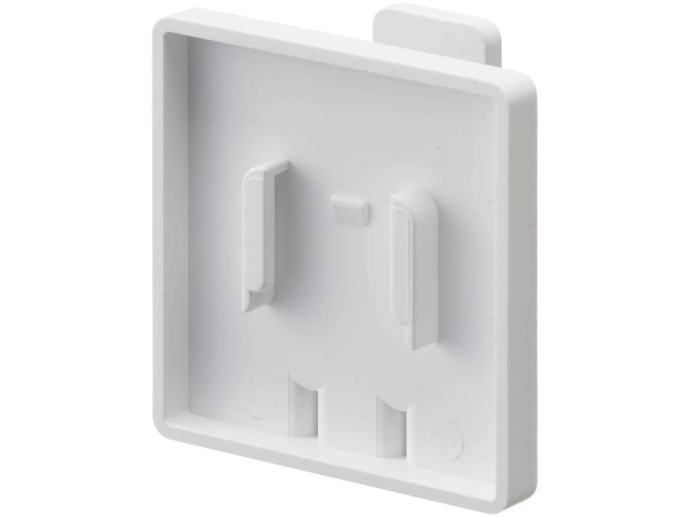 壁に取り付けられた【MIST/ミスト】フィルムフック タンブラーホルダー。周囲にはプラスチック製の電源ソケットやスイッチが配置されています