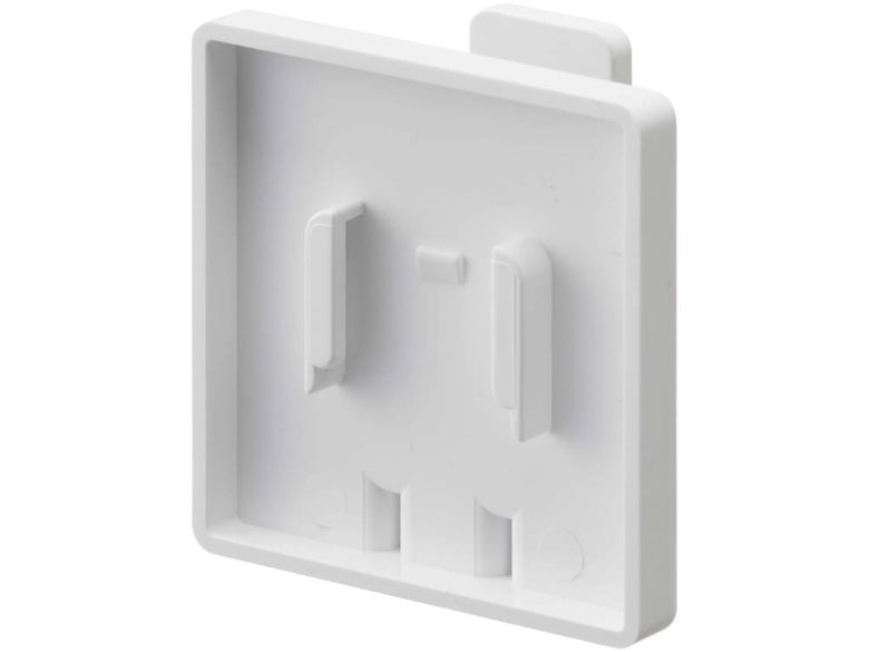 壁に取り付けられた【MIST/ミスト】フィルムフック タンブラーホルダー。周囲にはプラスチック製の電源ソケットやスイッチが配置されています