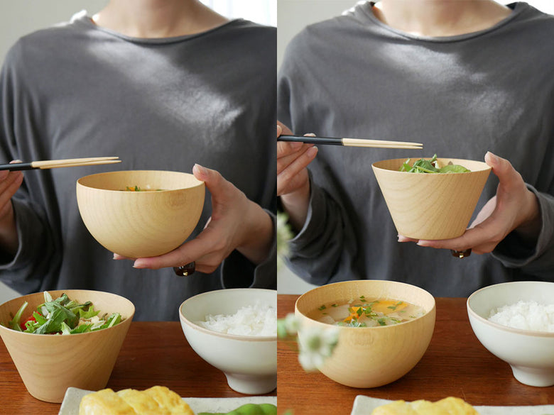 食卓に並べられた天然木製の丸型マルチボールと箸のセット