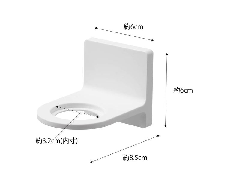 白いトイレシートが装着されたトイレと、バスルームに設置された【MIST/ミスト】フィルムフックディスペンサーホルダー