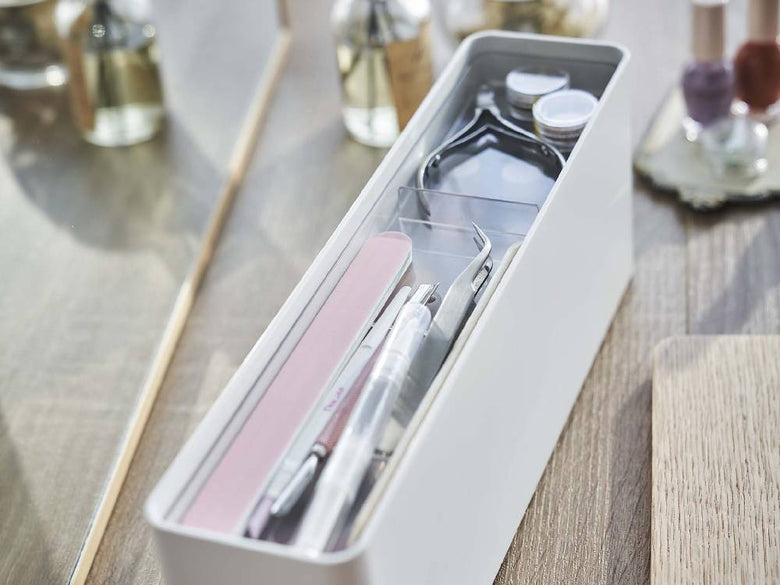 tosca（トスカ）のネイル収納ケース。天然木の蓋とプラスチック製の容器を使用し、コンパクトにネイルを整理できるデザイン