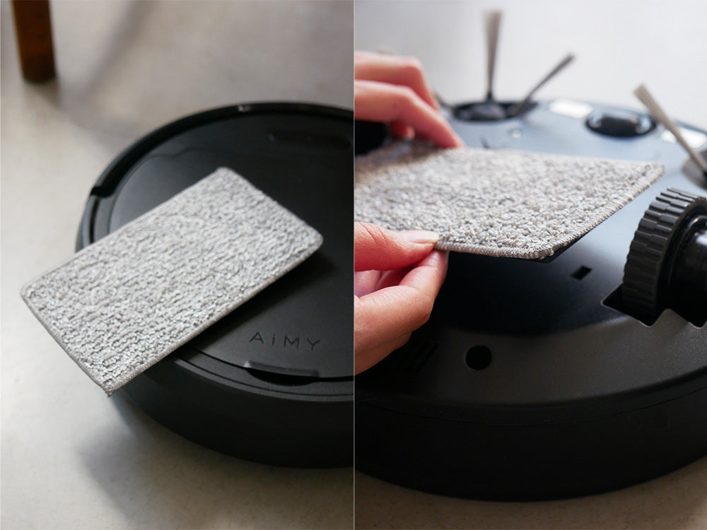 ブラックのAiMYロボットクリーナー本体と充電台