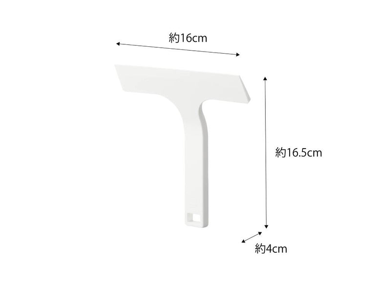 白色の「tower/タワー」マグネット水切りワイパーSがスチールの壁面に取り付けられている様子