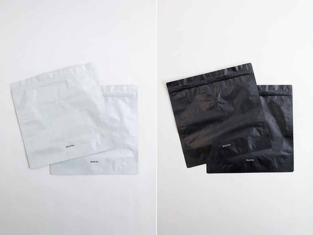 マーナの極お米保存袋を入れた紙製ショッピングバッグの写真