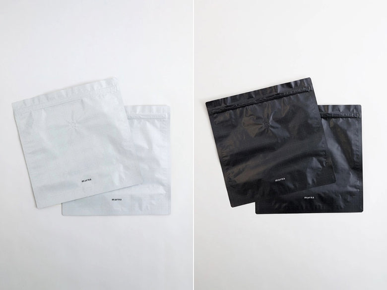 マーナの極お米保存袋を入れた紙製ショッピングバッグの写真