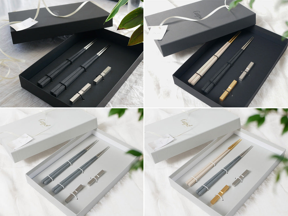 クチポールのKUBEシリーズ、天然樹脂と18-10ステンレス製の箸と箸置きがセットになった高級箸セット。ブラックシルバーカラーのギフトパッケージ