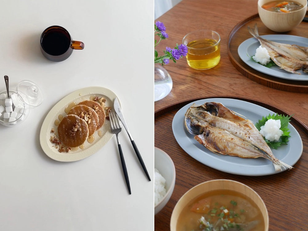 テーブルに並べられたSAKUZAN Saraオーバルプレートとボウルの食器セット