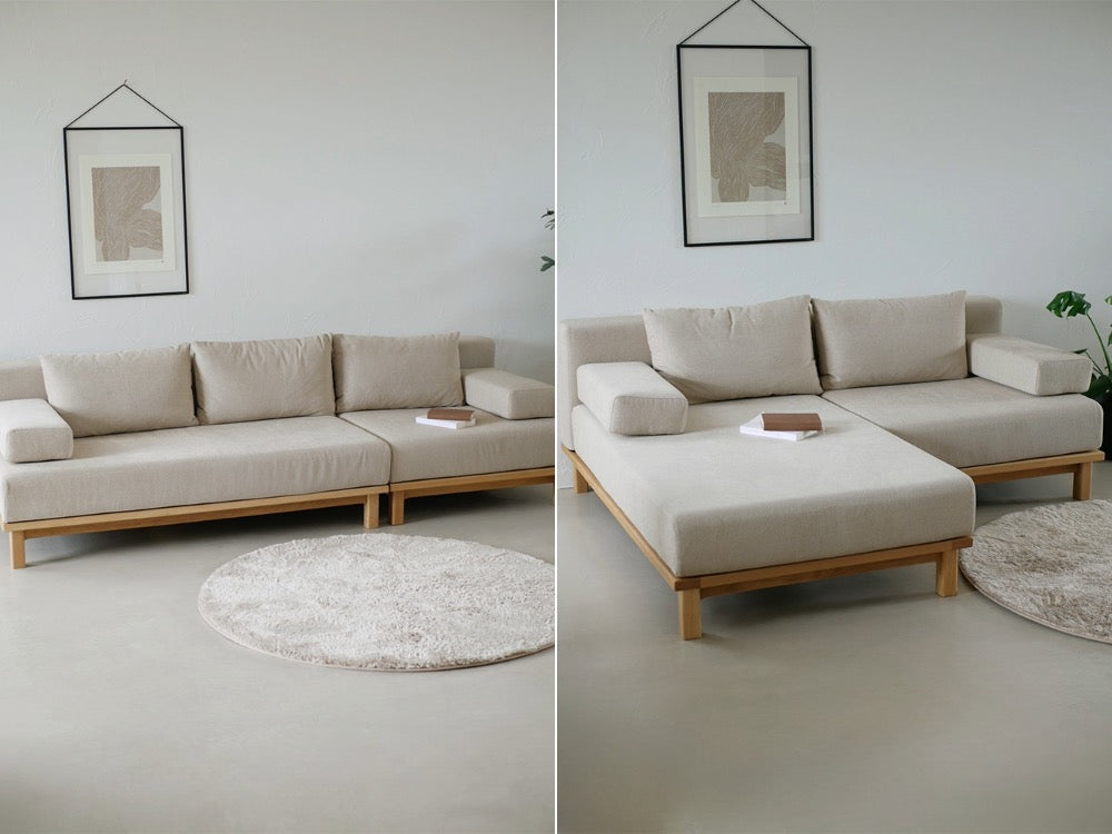 木製フレームとテキスタイルクッションが特徴のSIEVEゆったり座れるレクトユニットソファーが配置されたモダンなリビングルーム