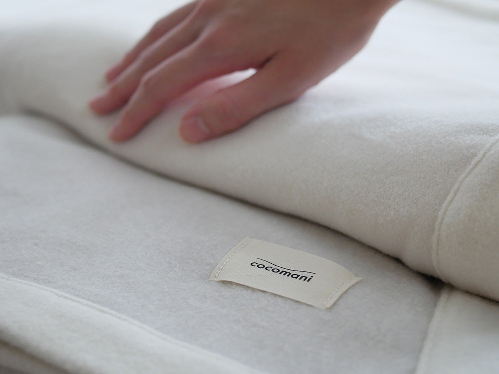cocomaniのアイボリー色オーガニックコットンシングル毛布