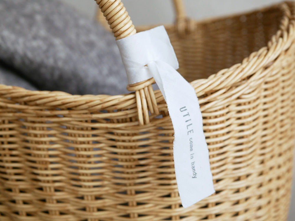 クレエ製ユティル洗えるナイールバスケット。持ち手付きのウィッカーストレージバスケットで、ピクニックやランドリーに最適です。
