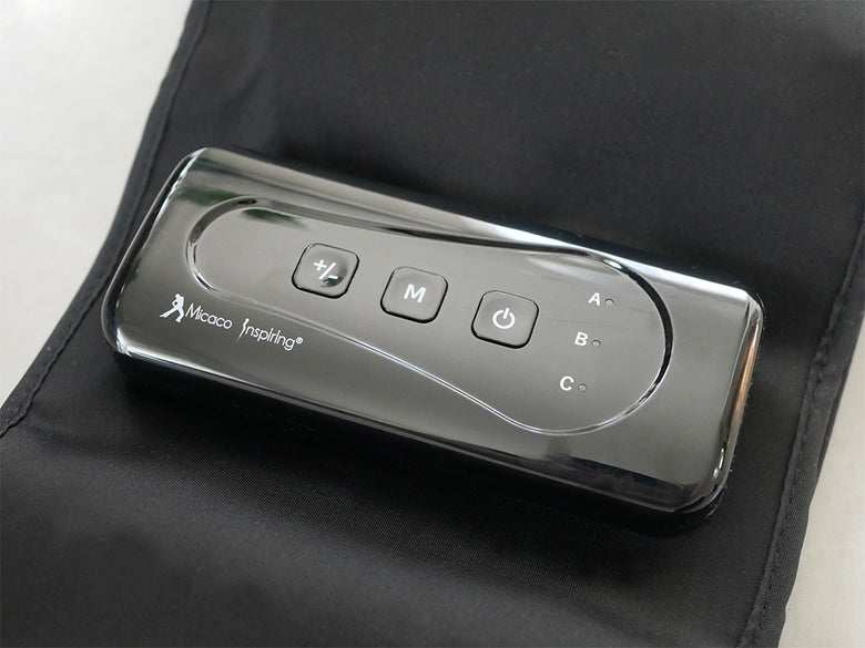 Micaco 骨盤ストレッチエアーベルト本体とコントローラー、付属品が並べられた画像