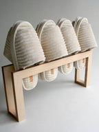 タカハシ産業のナチュラル樺プライウッド製スリッパラック。自然な木目が美しく、幅500mm×奥行100mm×高さ230mmのコンパクトなデザイン。