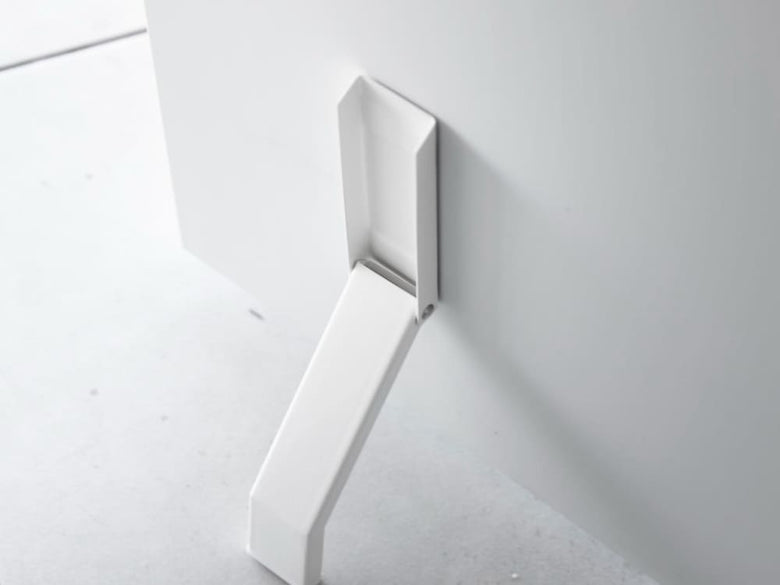 タワーの銀色スチール製マグネット折り畳みドアストッパーの実物写真、シリコーン滑り止め付き