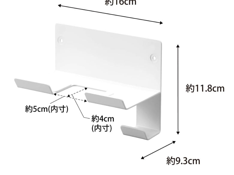 スチール製の『tower / タワー』ウォールドライヤーホルダーが壁に取り付けられている様子