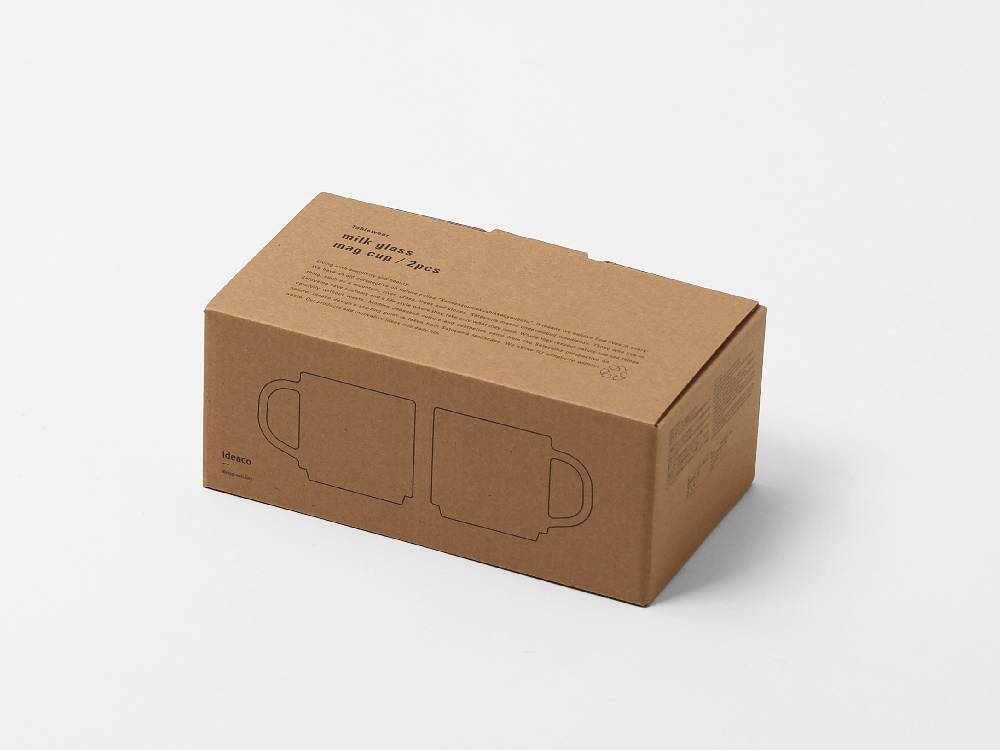 イデアコ製ミルクガラスマグカップ2個セットが梱包された段ボール箱の写真